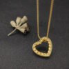 0DC600BE-634B-65FE-240A-F80EC7734A9E.jpg David Yurman Open Heart Cable Pendant in Yellow Gold