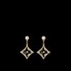 1A300AA9-2FD1-BD21-CB29-97495BDA9B48.jpg Color Blossom BB Star Ear Studs, Yellow Gold, Onyx And Diamonds