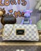24E0C40F-390A-378C-A715-648438CF0D3F.jpg Louis Vuitton Eva Clutch N55214