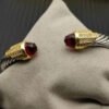 265F6DE2-2ABA-71F9-73EB-53DAA0FB7A38.jpg 7mm Cable Bracelet with Garnet & Diamond Accents ??Gold Cap