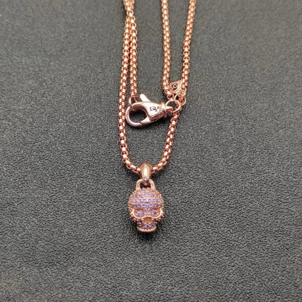 55342BCD-14A4-B265-E5FC-F3BC1F6639BD.jpg Skull Amulet Full Pavé Purple Sapphires and 18K Rose Gold, 14mm