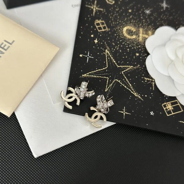 55F854CA-95DF-8CBA-499A-3C63A86E6EDD.jpg CC Earrings 0021