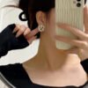 5EB058AD-3A86-2D2D-BBE9-68841DE67017.jpg CC Earrings 0005