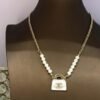 6B91FC9B-2268-A3F9-F4A5-437C96182009.jpg White bag pearl necklace