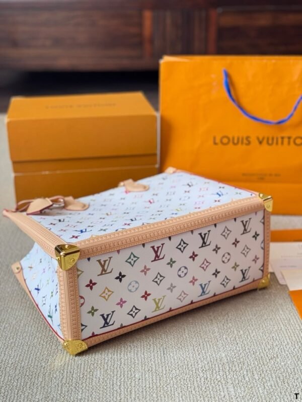 6FA6B6A5-A3ED-D887-3CDC-72074A2D0E14.jpg Louis Vuitton M13079 LV x TM OnTheGo MM