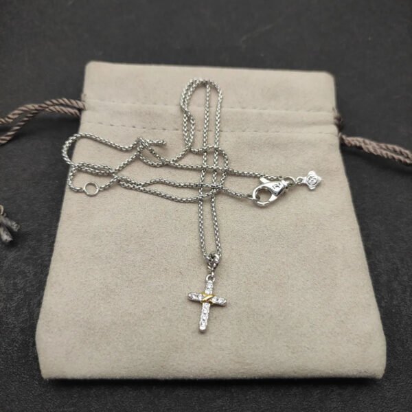 7133EB75-F554-8974-F7F8-F71A2D36E379.jpg Petite X Cross Necklace Sterling Silver with 14K Yellow Gold