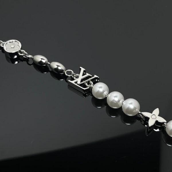 789D5064-1A25-BEAF-00DD-030F9E282803.jpg Pearls Fusion Bracelet