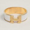 7FE60B77-09EB-7BD7-08CA-1AC070609FAB.jpg Hermes Clic Clac H bracelet