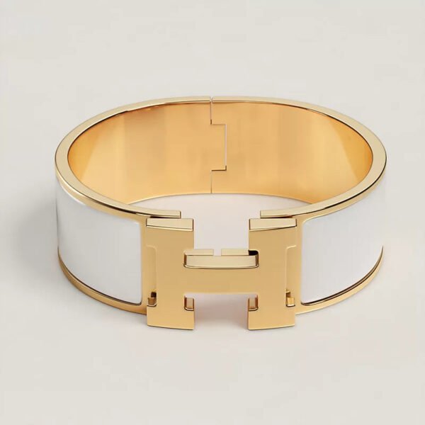 7FE60B77-09EB-7BD7-08CA-1AC070609FAB.jpg Hermes Clic Clac H bracelet