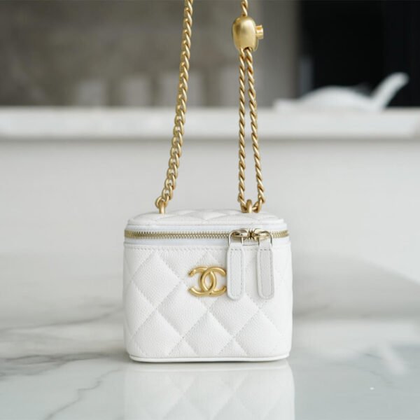 8B6169E3-CA14-3F42-908C-148731BE2671.jpg Chanel Small Gold Ball Makeup Bag