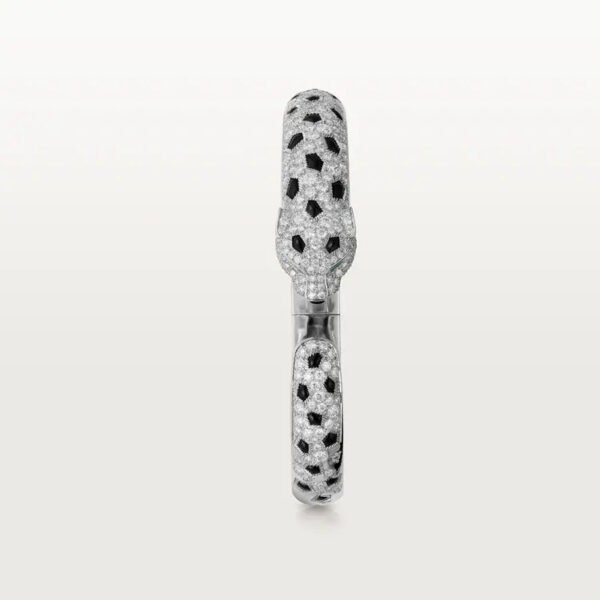 8D0AD135-5594-F44C-8C03-B62A9CF8BD45.jpg PANTHERE DE BRACELET