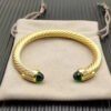 8FDD1924-5A48-CAE8-C5A0-44D66B7F60E0.jpg 7mm Cable Bracelet with Peridot & Diamond Accents