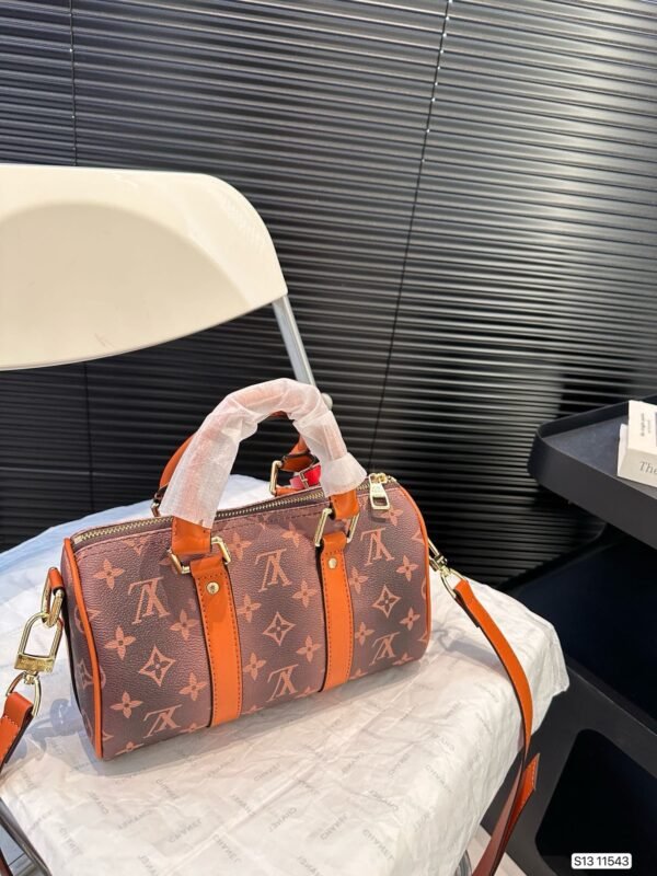 92C34A03-9386-DCCB-5AD5-02AB70F23122.jpg Louis Vuitton M11542 Keepall Bandoulière 25