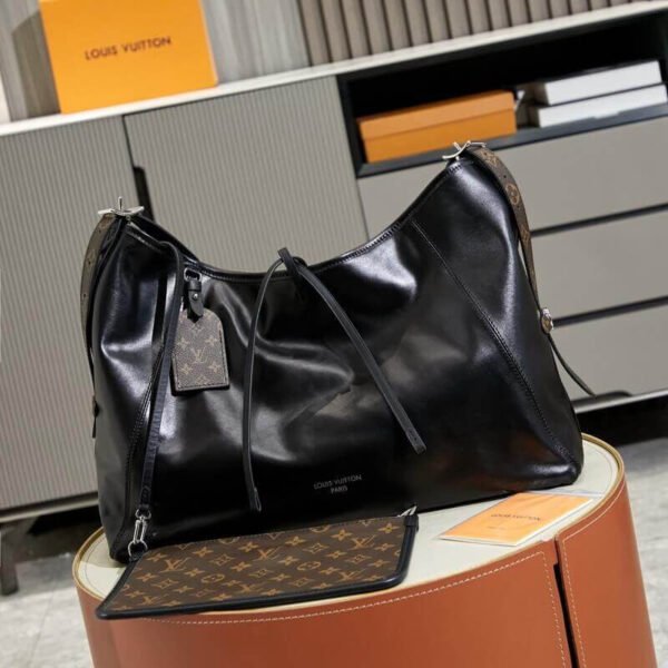 95DA4B20-91E4-860C-F0FA-8901562799FB.jpg Louis Vuitton M25143 CarryAll MM