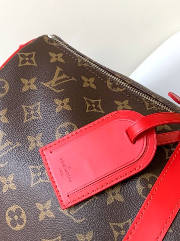 9928F9D4-D3A7-588E-C701-0C7F0A0F1278.jpg Louis Vuitton M46769 Keepall Bandoulière 50