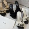 99E0EB3E-A33A-3D9D-9082-E41EF09DB7A8.jpg Chanel Off-white Ruffled Fabric CC Bow Slide Sandals