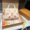 9D5A3470-733D-27BE-89E4-9BB1D00D7BCB.jpg Bicolor Monogram Emplant Shoulder Bag