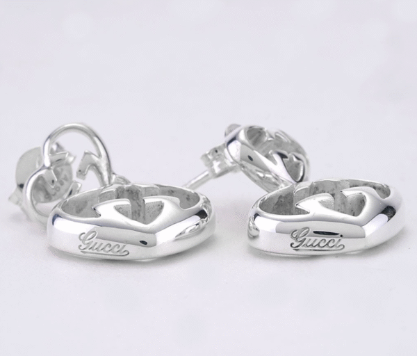 Love Britt G Heart Earrings in Silver