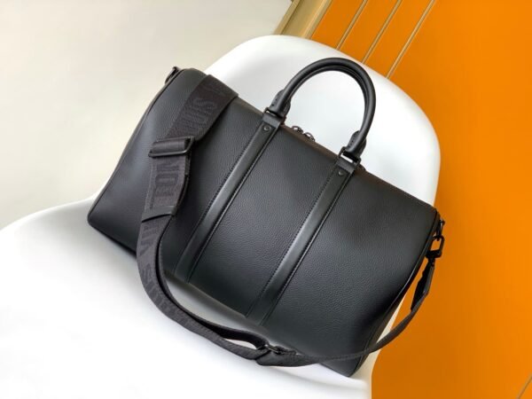 C3240AA0-7B06-6077-2BF7-1EBFBA1912DF.jpg Louis Vuitton M21420 Keepall Bandoulière 50