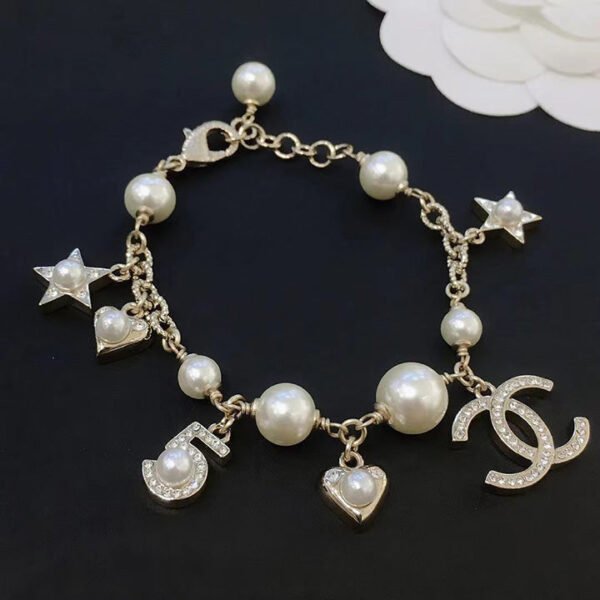 CE5B5A06-8903-596E-135E-720373CDD29C.jpg Pentagram Double C Pearl Bracelet
