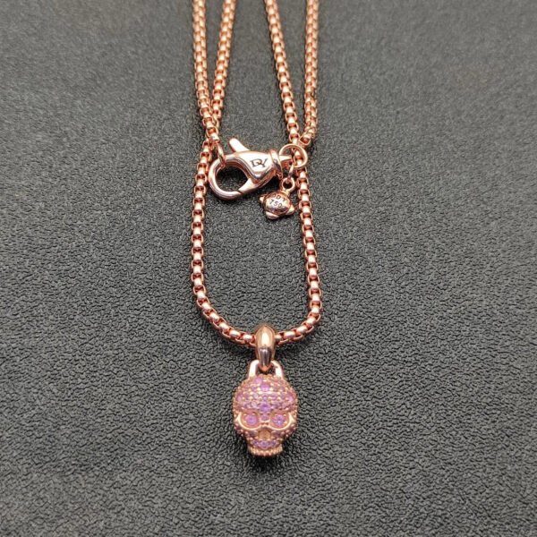 DA6FDBC9-C2B2-E929-1B27-1033934501FA.jpg Skull Amulet Full Pavé Purple Sapphires and 18K Rose Gold, 14mm