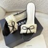E7FDDAC8-EC4F-E44E-2086-F81B03F00B71.jpg Chanel White/Black Ruffled Fabric CC Bow Slide Sandals