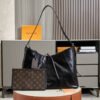 E8C2FD0F-0ADC-32C7-DFC0-0E0E685AD068.jpg Louis Vuitton M25143 CarryAll MM
