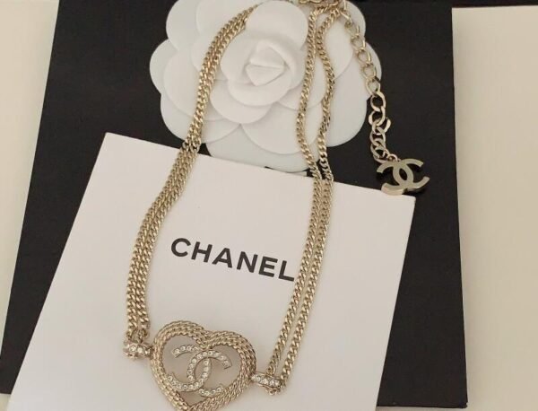 F1645843-FE07-7AD0-BA5F-6DD42D654E7E.jpg Wheat Heart Peach Heart Hollow Double C Double Chain Necklace