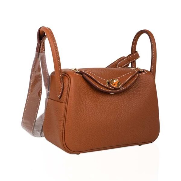 FEFFAE7A-0B99-4951-5D78-7649A911C488.jpg Mini Lindy 20 Bag Gold Clemence Leather with Gold Hardware
